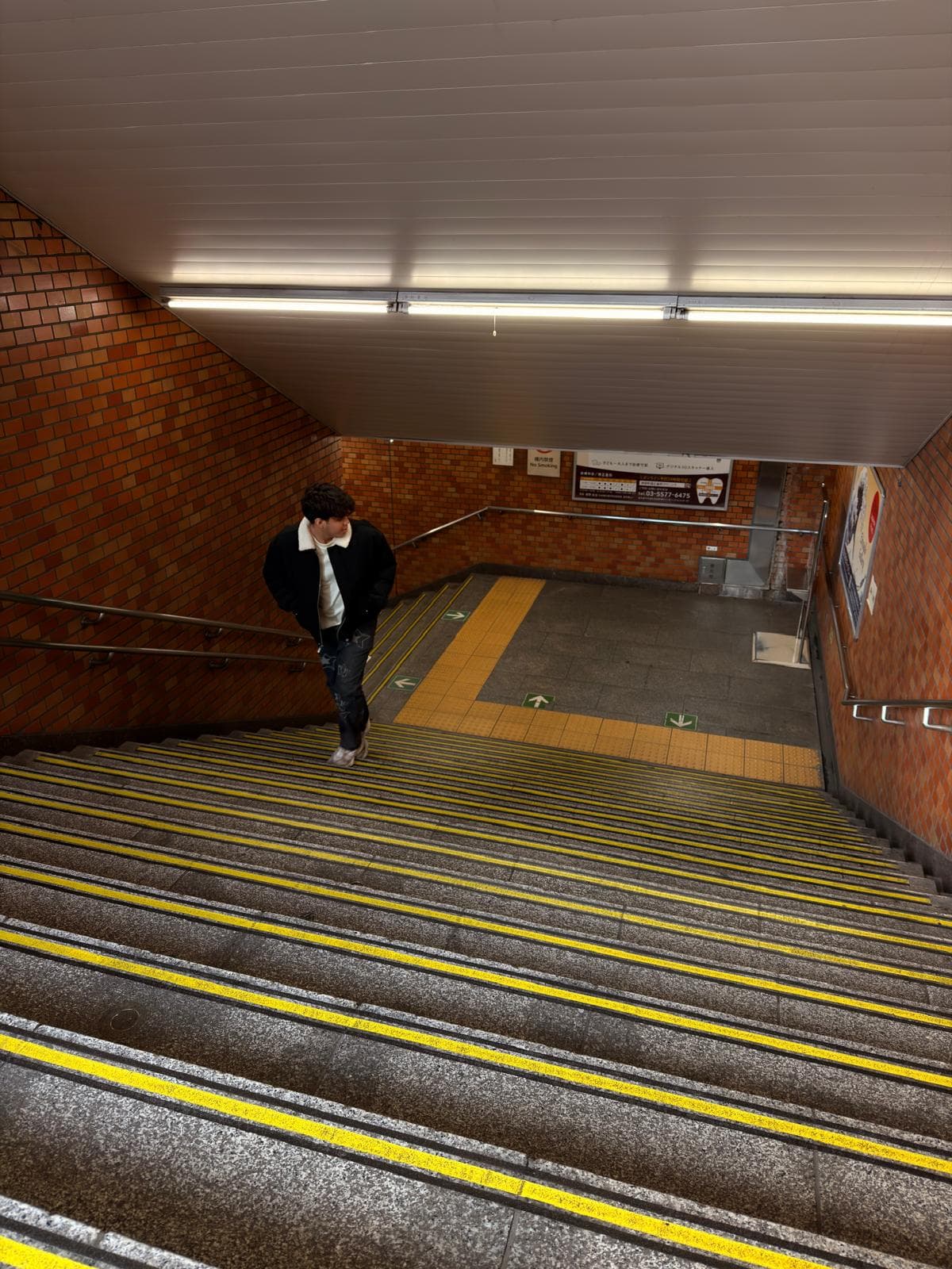 Andrew on subway stairs